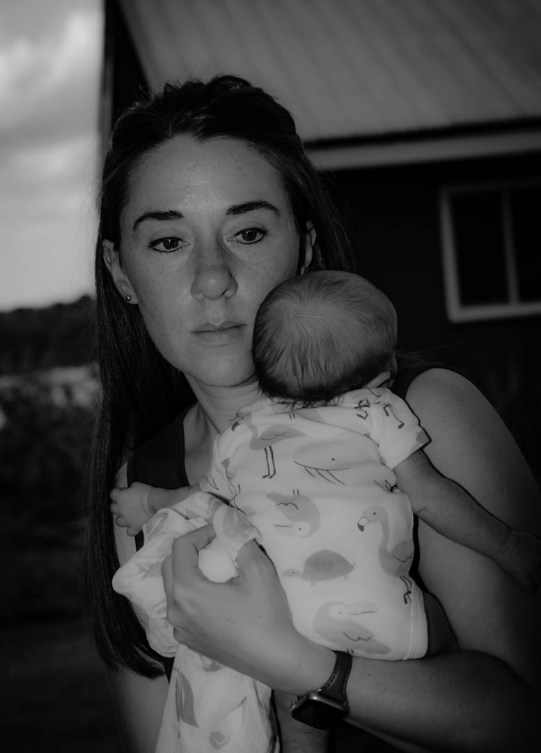 Christina holding her daughter